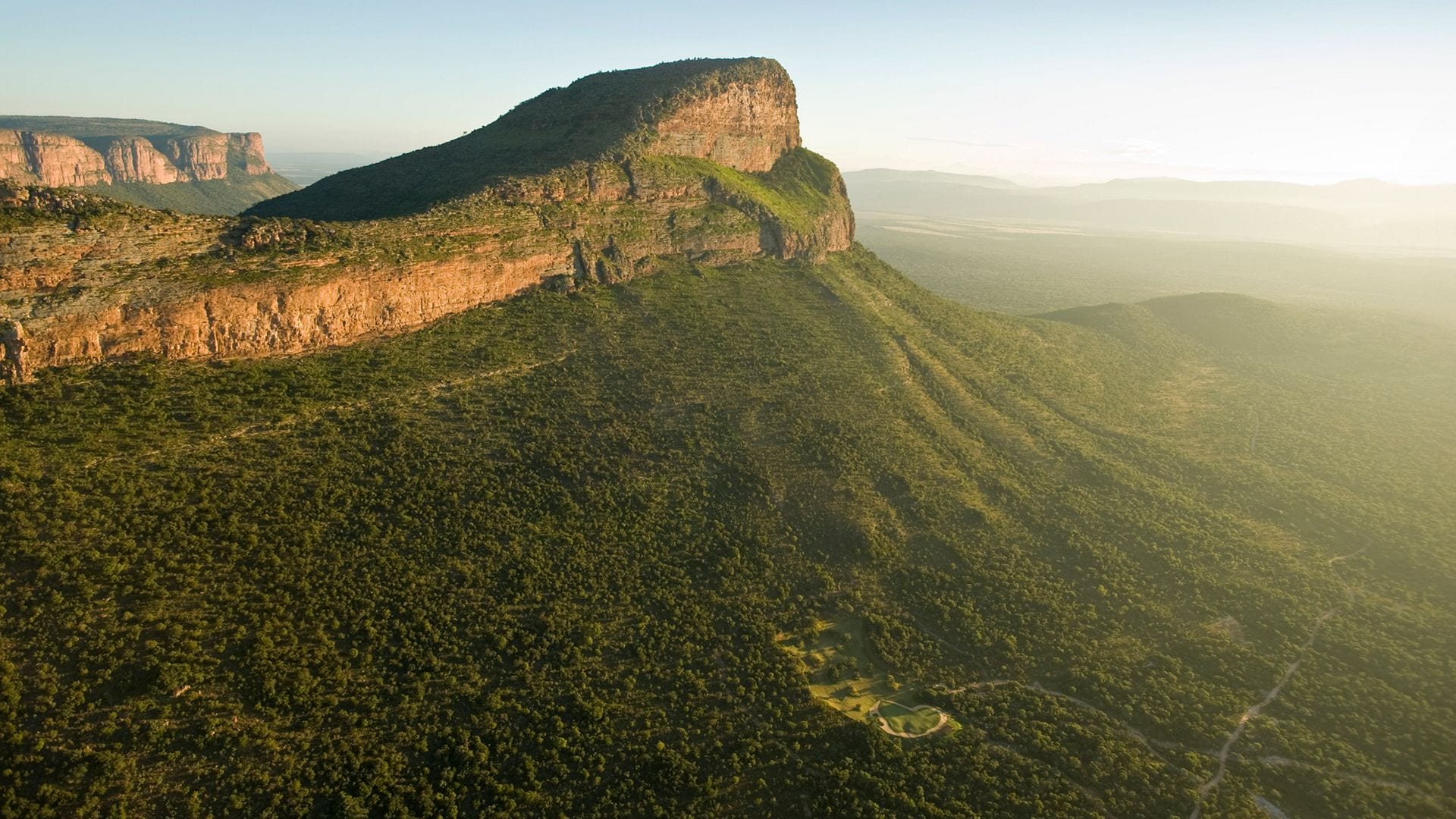 Extreme 19th helicopter par-3 at Legends Golf & Safari Resort — hosted golf tour