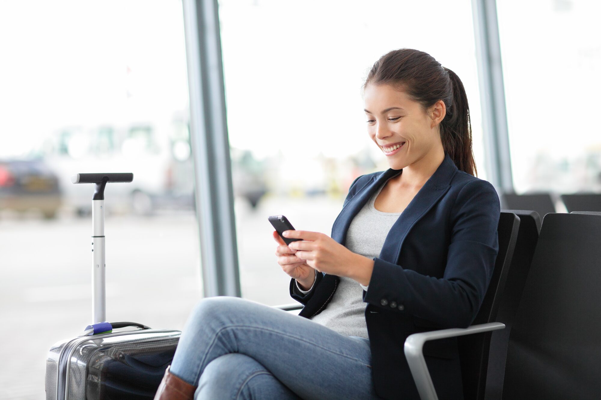Guest using the Journey Designer on a tablet, itinerary forming on screen