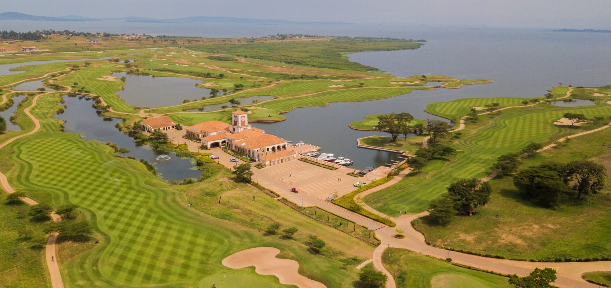 Island green at Lake Victoria Serena reflected at dusk